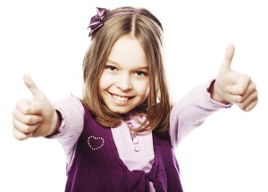 girl showing thumbs up isolated one white